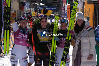 28/01/2024 - (L to R) Magni Smedaas (NOR), Emilie Fleten (NOR) and Kati Roivas (FIN) after the finish line of the 51th Edition of Marcialonga of Fiemme and Fassa, on 28th January, 2024, Cavalese, Trento, Italy. - 51TH MARCIALONGA OF FIEMME AND FASSA - SCI NORDICO - SPORT INVERNALI