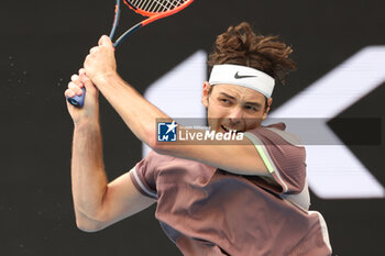 2024-01-14 - Taylor Fritz (USA) In action during their round one singles match against Facundo Diaz Acosta (BRA) on day one of the 2024 Australian Open at Melbourne Park on January 14, 2024 in Melbourne, Australia. - AUSTRALIAN OPEN - INTERNATIONALS - TENNIS