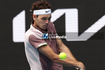 2024-01-14 - Taylor Fritz (USA) In action during their round one singles match against Facundo Diaz Acosta (BRA) on day one of the 2024 Australian Open at Melbourne Park on January 14, 2024 in Melbourne, Australia. - AUSTRALIAN OPEN - INTERNATIONALS - TENNIS