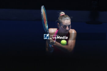 2024-01-23 - Marta Kostyuk (UKR) in action during their Quarterfinals singles match against Coco Gauff (USA) - AUSTRALIAN OPEN - INTERNATIONALS - TENNIS