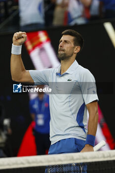 2024-01-23 - Novak Djokovic (SRB) celebrates after wins their quarterfinals match against Tayor Fritz (USA) - AUSTRALIAN OPEN - INTERNATIONALS - TENNIS