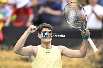 2024-01-18 - Carlos Alcaraz of Spain celebrates his victory during the Australian Open AO 2024 Grand Slam tennis tournament on January 18, 2024 at Melbourne Park in Australia. Photo Victor Joly / DPPI - TENNIS - AUSTRALIAN OPEN 2024 - WEEK 1 - INTERNATIONALS - TENNIS