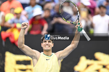 2024-01-18 - Carlos Alcaraz of Spain celebrates his victory during the Australian Open AO 2024 Grand Slam tennis tournament on January 18, 2024 at Melbourne Park in Australia. Photo Victor Joly / DPPI - TENNIS - AUSTRALIAN OPEN 2024 - WEEK 1 - INTERNATIONALS - TENNIS