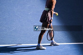 2024-01-20 - Illustration picture shows the body and shadow of a female woman player during a serve during the Australian Open AO 2024 Grand Slam tennis tournament on January 20, 2024 at Melbourne Park in Australia. Photo Victor Joly / DPPI - TENNIS - AUSTRALIAN OPEN 2024 - WEEK 1 - INTERNATIONALS - TENNIS