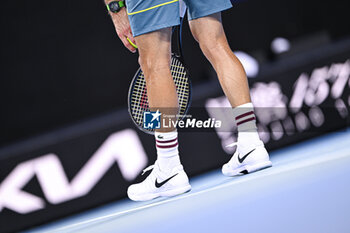 2024-01-20 - Shoes and racket of Grigor Dimitrov of Bulgaria during the Australian Open AO 2024 Grand Slam tennis tournament on January 20, 2024 at Melbourne Park in Australia. Photo Victor Joly / DPPI - TENNIS - AUSTRALIAN OPEN 2024 - WEEK 1 - INTERNATIONALS - TENNIS