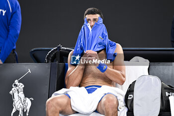 2024-01-19 - Novak Djokovic of Serbia bare-chested shirtless or naked torso during the Australian Open AO 2024 Grand Slam tennis tournament on January 19, 2024 at Melbourne Park in Australia. Photo Victor Joly / DPPI - TENNIS - AUSTRALIAN OPEN 2024 - WEEK 1 - INTERNATIONALS - TENNIS