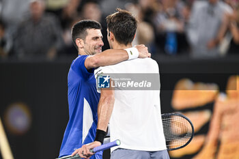 2024-01-19 - Novak Djokovic and Tomas Martin Etcheverry during the Australian Open AO 2024 Grand Slam tennis tournament on January 19, 2024 at Melbourne Park in Australia. Photo Victor Joly / DPPI - TENNIS - AUSTRALIAN OPEN 2024 - WEEK 1 - INTERNATIONALS - TENNIS
