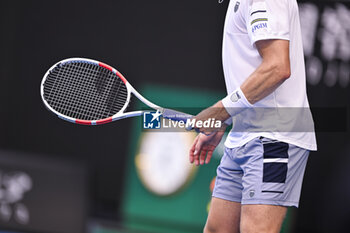2024-01-22 - Illustration picture shows the body and racket of a male man player during the Australian Open 2024, Grand Slam tennis tournament on January 22, 2024 at Melbourne Park in Melbourne, Australia - TENNIS - AUSTRALIAN OPEN 2024 - WEEK 2 - INTERNATIONALS - TENNIS
