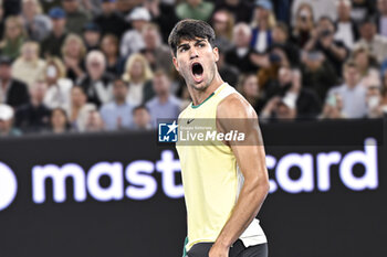 2024-01-22 - Carlos Alcaraz Garfia of Spain during the Australian Open 2024, Grand Slam tennis tournament on January 22, 2024 at Melbourne Park in Melbourne, Australia - TENNIS - AUSTRALIAN OPEN 2024 - WEEK 2 - INTERNATIONALS - TENNIS