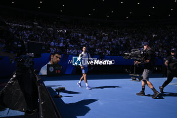 2024-01-23 - Novak Djokovic of Serbia enters the court during the Australian Open 2024 Grand Slam tennis tournament on January 22, 2024 at Melbourne Park in Melbourne, Australia. Photo Victor Joly / DPPI - TENNIS - AUSTRALIAN OPEN 2024 - WEEK 2 - INTERNATIONALS - TENNIS