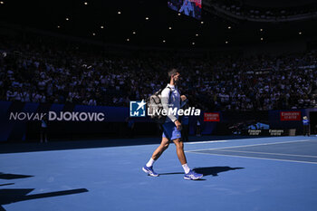 2024-01-23 - Novak Djokovic of Serbia enters the court during the Australian Open 2024 Grand Slam tennis tournament on January 22, 2024 at Melbourne Park in Melbourne, Australia. Photo Victor Joly / DPPI - TENNIS - AUSTRALIAN OPEN 2024 - WEEK 2 - INTERNATIONALS - TENNIS