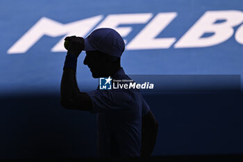 2024-01-23 - Novak Djokovic in the dark shadows (illustration of shadow silhouette or shade) during the Australian Open 2024 Grand Slam tennis tournament on January 22, 2024 at Melbourne Park in Melbourne, Australia. Photo Victor Joly / DPPI - TENNIS - AUSTRALIAN OPEN 2024 - WEEK 2 - INTERNATIONALS - TENNIS