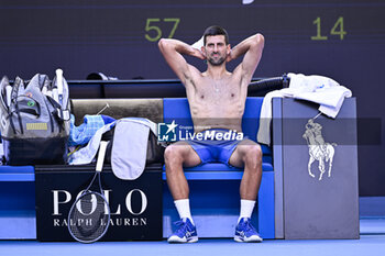 2024-01-23 - Novak Djokovic of Serbia bare-chested shirtless or naked torso during the Australian Open 2024 Grand Slam tennis tournament on January 22, 2024 at Melbourne Park in Melbourne, Australia. Photo Victor Joly / DPPI - TENNIS - AUSTRALIAN OPEN 2024 - WEEK 2 - INTERNATIONALS - TENNIS