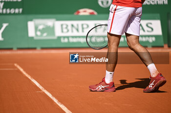 2024-04-11 - Illustration of shoes and racket of Novak Djokovic during the Rolex Monte-Carlo ATP Masters 1000 tennis on April 11, 2024 at Monte Carlo Country Club in Roquebrune Cap Martin, France near Monaco. Photo Victor Joly / DPPI - TENNIS - ROLEX MONTE CARLO MASTERS 2024 - 11/04 - INTERNATIONALS - TENNIS