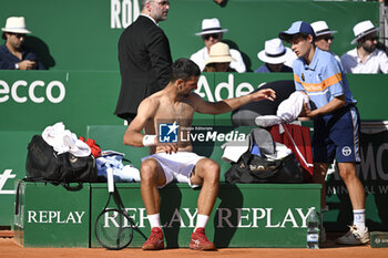 2024-04-12 - Novak Djokovic bare-chested shirtless or naked torso during the Rolex Monte-Carlo ATP Masters 1000 tennis on April 12, 2024 at Monte Carlo Country Club in Roquebrune Cap Martin, France near Monaco. Photo Victor Joly / DPPI - TENNIS - ROLEX MONTE CARLO MASTERS 2024 - 12/04 - INTERNATIONALS - TENNIS