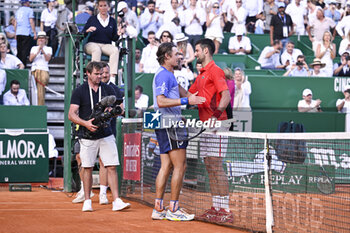 2024-04-12 - Novak Djokovic and Alex De Minaur during the Rolex Monte-Carlo ATP Masters 1000 tennis on April 12, 2024 at Monte Carlo Country Club in Roquebrune Cap Martin, France near Monaco. Photo Victor Joly / DPPI - TENNIS - ROLEX MONTE CARLO MASTERS 2024 - 12/04 - INTERNATIONALS - TENNIS