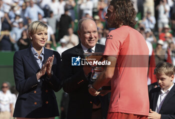 2024-04-14 - Winner Stefanos Tsitsipas of Greece with Princess Charlene of Monaco and Prince Albert II of Monaco during the podium ceremony on day 8 of the Rolex Monte-Carlo 2024, ATP Masters 1000 tennis event on April 14, 2024 at Monte-Carlo Country Club in Roquebrune Cap Martin, France - TENNIS - ROLEX MONTE CARLO MASTERS 2024 - 14/04 - INTERNATIONALS - TENNIS