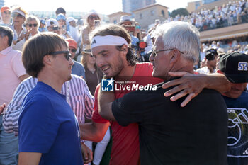 2024-04-14 - Stefanos Tsitsipas of Greece celebrates - with his father-coach Apostolos Tsitsipas - winning the final against Casper Ruud of Norway during day 8 of the Rolex Monte-Carlo 2024, ATP Masters 1000 tennis event on April 14, 2024 at Monte-Carlo Country Club in Roquebrune Cap Martin, France - TENNIS - ROLEX MONTE CARLO MASTERS 2024 - 14/04 - INTERNATIONALS - TENNIS