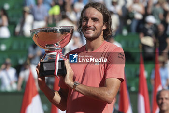 2024-04-14 - Winner Stefanos Tsitsipas of Greece celebrates during the podium ceremony after his victory in the final against Casper Ruud of Norway during day 8 of the Rolex Monte-Carlo 2024, ATP Masters 1000 tennis event on April 14, 2024 at Monte-Carlo Country Club in Roquebrune Cap Martin, France - TENNIS - ROLEX MONTE CARLO MASTERS 2024 - 14/04 - INTERNATIONALS - TENNIS