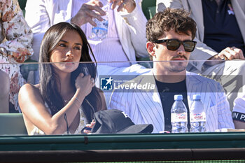 2024-04-14 - Charles Leclerc and his girlfriend Alexandra Saint Mleux during the Rolex Monte-Carlo final ATP Masters 1000 tennis on April 14, 2024 at Monte Carlo Country Club in Roquebrune Cap Martin, France near Monaco. Photo Victor Joly / DPPI - TENNIS - ROLEX MONTE CARLO MASTERS 2024 - 14/04 - INTERNATIONALS - TENNIS