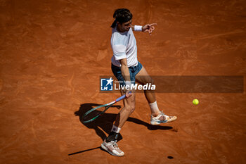 2024-04-19 - Tomas Etcheverry (Argentina) plays forehand shot against Cameron Norrie (UK) during a quarterfinal ATP 500 Barcelona Open Banc Sabadell 2024 match at Real Club de Tenis de Barcelona, in Barcelona, Spain on April 19, 2024. Photo by Felipe Mondino - ATP 500 BARCELONA OPEN BANC SABADELL 2024 - CAMERON NORRIE (UK) VS TOMAS ETCHEVERRY (ARG) - INTERNATIONALS - TENNIS