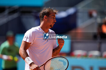2024-04-22 - Felipe Meligeni Alves of Brazil in action against Dominic Thiem of Austria during the Mutua Madrid Open 2024, ATP Masters 1000 and WTA 1000, tennis tournament on April 22, 2024 at Caja Magica in Madrid, Spain - TENNIS - MUTUA MADRID OPEN 2024 - INTERNATIONALS - TENNIS