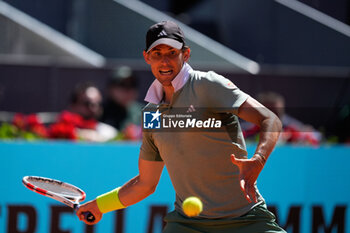 2024-04-22 - Dominic Thiem of Austria in action against Felipe Meligeni Alves of Brazil during the Mutua Madrid Open 2024, ATP Masters 1000 and WTA 1000, tennis tournament on April 22, 2024 at Caja Magica in Madrid, Spain - TENNIS - MUTUA MADRID OPEN 2024 - INTERNATIONALS - TENNIS