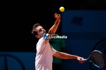 2024-04-22 - Albert Ramos of Spain in action against Diego Schwartzman of Argentina during the Mutua Madrid Open 2024, ATP Masters 1000 and WTA 1000, tennis tournament on April 22, 2024 at Caja Magica in Madrid, Spain - TENNIS - MUTUA MADRID OPEN 2024 - INTERNATIONALS - TENNIS