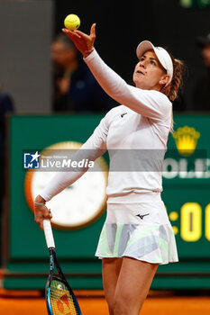 2024-04-22 - Anna Bondar of Hungary in action against Carlota Martinez Cirez of Spain during the Mutua Madrid Open 2024, ATP Masters 1000 and WTA 1000, tennis tournament on April 22, 2024 at Caja Magica in Madrid, Spain - TENNIS - MUTUA MADRID OPEN 2024 - INTERNATIONALS - TENNIS