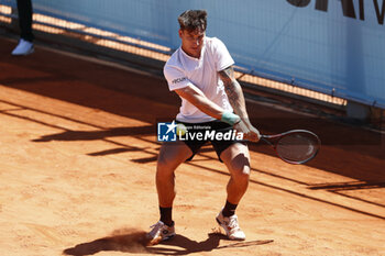 2024-04-22 - Ugo Carabelli of Argentina in action against Bernabe Zatapa of Spain during the Mutua Madrid Open 2024, ATP Masters 1000 and WTA 1000, tennis tournament on April 22, 2024 at Caja Magica in Madrid, Spain - TENNIS - MUTUA MADRID OPEN 2024 - INTERNATIONALS - TENNIS
