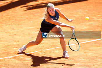 2024-04-22 - Maria Timofeeva of Russia in action against Fiona Ferro of France during the Mutua Madrid Open 2024, ATP Masters 1000 and WTA 1000, tennis tournament on April 22, 2024 at Caja Magica in Madrid, Spain - TENNIS - MUTUA MADRID OPEN 2024 - INTERNATIONALS - TENNIS