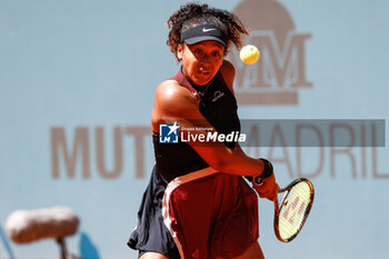 2024-04-24 - Naomi Osaka of Japan in action against Greet Minnen of Belgium during the Mutua Madrid Open 2024, ATP Masters 1000 and WTA 1000, tennis tournament on April 24, 2024 at Caja Magica in Madrid, Spain - TENNIS - MUTUA MADRID OPEN 2024 - INTERNATIONALS - TENNIS