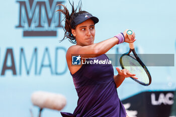 2024-04-24 - Maria Lourdes Carle of Argentina in action against Emma Raducano of Great Britain during the Mutua Madrid Open 2024, ATP Masters 1000 and WTA 1000, tennis tournament on April 24, 2024 at Caja Magica in Madrid, Spain - TENNIS - MUTUA MADRID OPEN 2024 - INTERNATIONALS - TENNIS