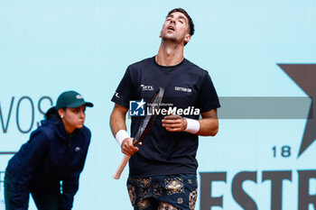 2024-04-24 - Thanasi Kokkinakis of Australia in action against Jack Draper of Great Britain during the Mutua Madrid Open 2024, ATP Masters 1000 and WTA 1000, tennis tournament on April 24, 2024 at Caja Magica in Madrid, Spain - TENNIS - MUTUA MADRID OPEN 2024 - INTERNATIONALS - TENNIS