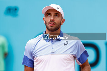 24/04/2024 - Borna Coric of Croatia in action against Benjamin Hassan of Germany during the Mutua Madrid Open 2024, ATP Masters 1000 and WTA 1000, tennis tournament on April 24, 2024 at Caja Magica in Madrid, Spain - TENNIS - MUTUA MADRID OPEN 2024 - INTERNAZIONALI - TENNIS