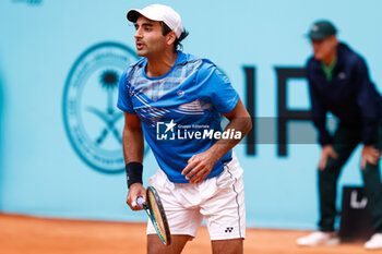 2024-04-24 - Benjamin Hassan of Germany in action against Borna Coric of Croatia during the Mutua Madrid Open 2024, ATP Masters 1000 and WTA 1000, tennis tournament on April 24, 2024 at Caja Magica in Madrid, Spain - TENNIS - MUTUA MADRID OPEN 2024 - INTERNATIONALS - TENNIS