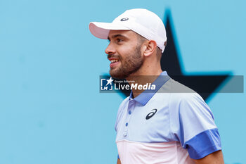 2024-04-24 - Borna Coric of Croatia in action against Benjamin Hassan of Germany during the Mutua Madrid Open 2024, ATP Masters 1000 and WTA 1000, tennis tournament on April 24, 2024 at Caja Magica in Madrid, Spain - TENNIS - MUTUA MADRID OPEN 2024 - INTERNATIONALS - TENNIS