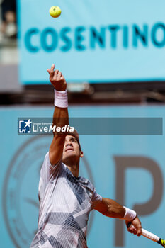 2024-04-26 - Facundo Bagnis of Argentina in action against Andrey Rublev of Russia during the Mutua Madrid Open 2024, ATP Masters 1000 and WTA 1000, tennis tournament on April 26, 2024 at Caja Magica in Madrid, Spain - TENNIS - MUTUA MADRID OPEN 2024 - INTERNATIONALS - TENNIS