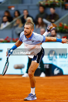 2024-04-26 - Borna Coric of Croatia in action against Alexander Zverev of Germany during the Mutua Madrid Open 2024, ATP Masters 1000 and WTA 1000, tennis tournament on April 26, 2024 at Caja Magica in Madrid, Spain - TENNIS - MUTUA MADRID OPEN 2024 - INTERNATIONALS - TENNIS