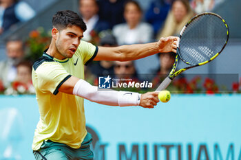 2024-04-28 - Carlos Alcaraz of Spain in action against Thiago Seyboth Wild of Brazil during the Mutua Madrid Open 2024, ATP Masters 1000 and WTA 1000, tennis tournament on April 28, 2024 at Caja Magica in Madrid, Spain - TENNIS - MUTUA MADRID OPEN 2024 - INTERNATIONALS - TENNIS