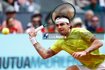 28/04/2024 - Thiago Seyboth Wild of Brazil in action against Carlos Alcaraz of Spain during the Mutua Madrid Open 2024, ATP Masters 1000 and WTA 1000, tennis tournament on April 28, 2024 at Caja Magica in Madrid, Spain - TENNIS - MUTUA MADRID OPEN 2024 - INTERNAZIONALI - TENNIS