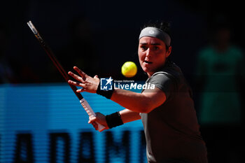29/04/2024 - Ons Jabeur of Tunisia in action against Jelena Ostapenko of Latvia during the Mutua Madrid Open 2024, ATP Masters 1000 and WTA 1000, tennis tournament on April 29, 2024 at Caja Magica in Madrid, Spain - TENNIS - MUTUA MADRID OPEN 2024 - INTERNAZIONALI - TENNIS