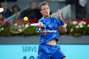 2024-04-30 - Jiri Lehecka of Czech Republic in action against Rafael Nadal of Spain during the Mutua Madrid Open 2024, ATP Masters 1000 and WTA 1000, tennis tournament on April 30, 2024 at Caja Magica in Madrid, Spain - TENNIS - MUTUA MADRID OPEN 2024 - INTERNATIONALS - TENNIS