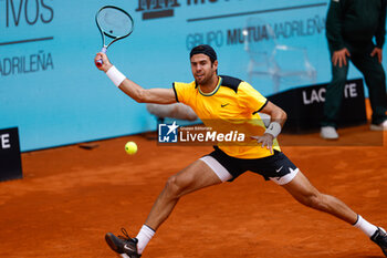 2024-04-30 - Karen Khachanov of Russia in action against Jannik Sinner of Italy during the Mutua Madrid Open 2024, ATP Masters 1000 and WTA 1000, tennis tournament on April 30, 2024 at Caja Magica in Madrid, Spain - TENNIS - MUTUA MADRID OPEN 2024 - INTERNATIONALS - TENNIS