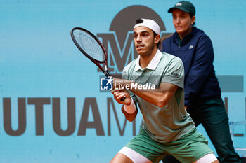 30/04/2024 - Francisco Cerundolo of Argentina in action against Alexander Zverev of Germany during the Mutua Madrid Open 2024, ATP Masters 1000 and WTA 1000, tennis tournament on April 30, 2024 at Caja Magica in Madrid, Spain - TENNIS - MUTUA MADRID OPEN 2024 - INTERNAZIONALI - TENNIS