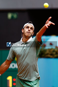 2024-04-30 - Francisco Cerundolo of Argentina in action against Alexander Zverev of Germany during the Mutua Madrid Open 2024, ATP Masters 1000 and WTA 1000, tennis tournament on April 30, 2024 at Caja Magica in Madrid, Spain - TENNIS - MUTUA MADRID OPEN 2024 - INTERNATIONALS - TENNIS