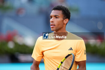 2024-05-03 - Felix Auger Aliassime of Canada in action against Jiri Lehecka of Czech Republic during the Mutua Madrid Open 2024, ATP Masters 1000 and WTA 1000, tennis tournament on May 3, 2024 at Caja Magica in Madrid, Spain - TENNIS - MUTUA MADRID OPEN 2024 - INTERNATIONALS - TENNIS