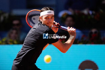 03/05/2024 - Taylor Fritz of United States in action against Andrey Rublev of Russia during the Mutua Madrid Open 2024, ATP Masters 1000 and WTA 1000, tennis tournament on May 3, 2024 at Caja Magica in Madrid, Spain - TENNIS - MUTUA MADRID OPEN 2024 - INTERNAZIONALI - TENNIS