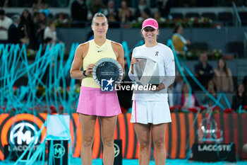 04/05/2024 - Iga Swiatek of Poland (Winner) and Aryna Sabalenka of Belarus (runner-up) with the trophies during the Mutua Madrid Open 2024, ATP Masters 1000 and WTA 1000, tennis tournament on May 4, 2024 at Caja Magica in Madrid, Spain - TENNIS - MUTUA MADRID OPEN 2024 - INTERNAZIONALI - TENNIS