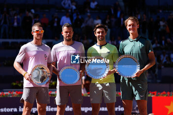 2024-05-04 - Sebastian Korda of United States and Jordan Thompson of Australia (Winners), Ariel Behar of Uruguay and Adam Pavlasek of Czech Republic (runners-up) after the doubles Final match during the Mutua Madrid Open 2024, ATP Masters 1000 and WTA 1000, tennis tournament on May 4, 2024 at Caja Magica in Madrid, Spain - TENNIS - MUTUA MADRID OPEN 2024 - INTERNATIONALS - TENNIS